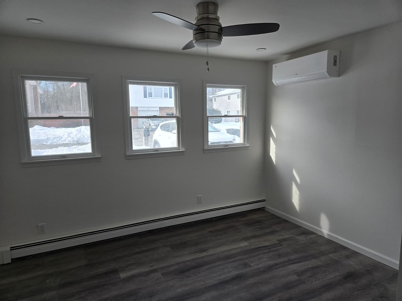 Bright bedroom with windows